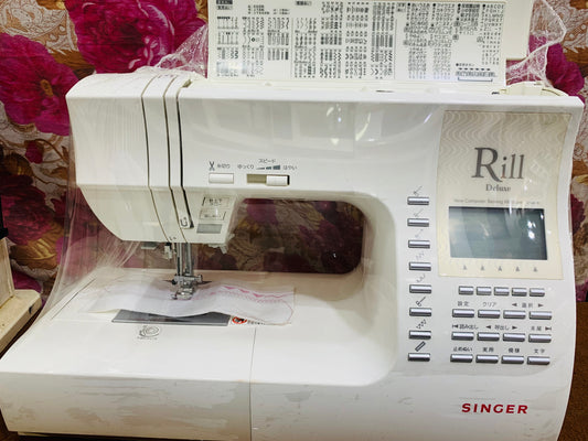 Singer deluxe rill 1050dx